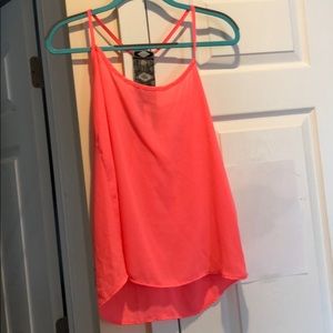 Pink spaghetti strap top.